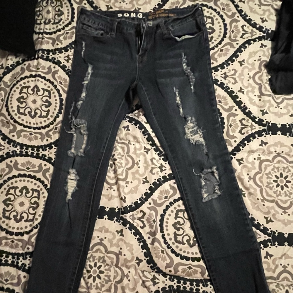Super skinny jeans “distressed” size 11